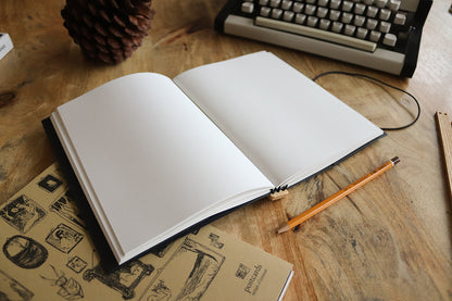 the one with the pencil. a5, black